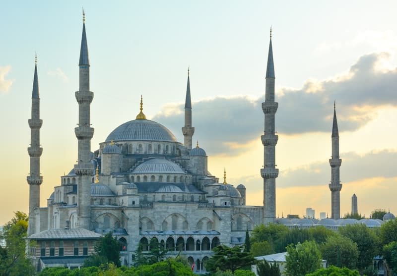 The Blue Mosque and Istanbul skyline at dusk over the Bosphorus